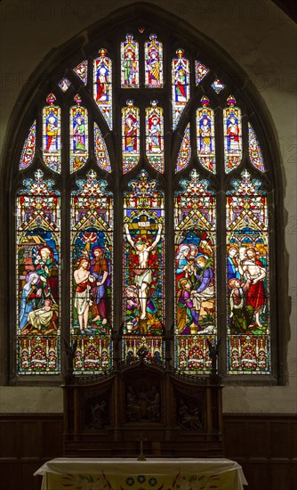 Stained glass window East Bergholt church, Suffolk, England, UK, Crucifixion, Doubting Thomas, Nativity, Baptism of Jesus Christ, He is Risen c 1865 by Lavers, Barraud and Westlake