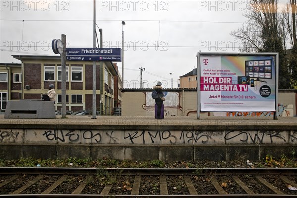 Soiled railway tracks with platform in the Friedrichstadt district, Duesseldorf, North Rhine-Westphalia, Germany, Europe