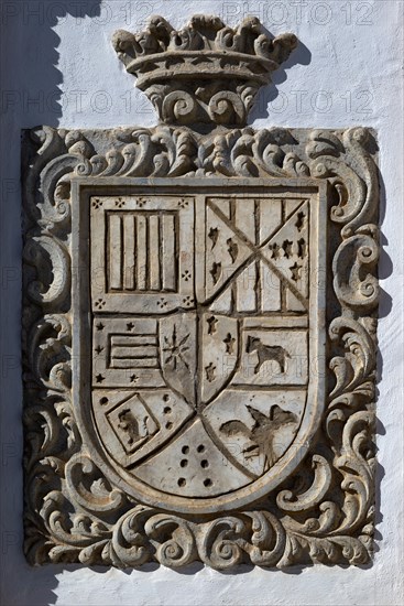 Stone heraldic family Coat of Arms on wall of building, Frigiliana, Axarquia, Andalusia, Spain, Europe