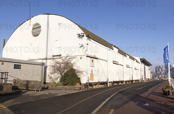 Historic corrugated iron warehouses, Ipswich Wet Dock waterside redevelopment, Ipswich, Suffolk, England, Uk