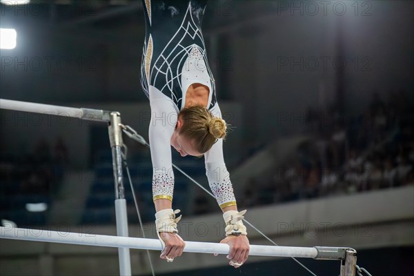 Heidelberg, 9 September 2023: Women's apparatus gymnastics national competition in the SNP Dome in Heidelberg. Anne-Lena Koenig performs on the uneven bars