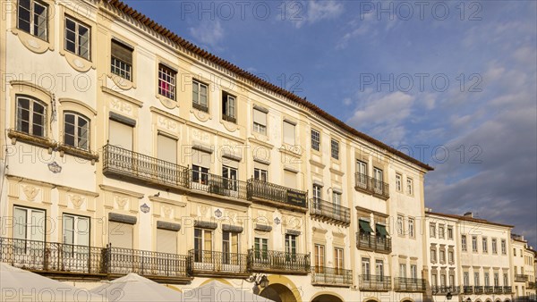 Historic buildings in famous city centre square in soft late afternoon light at dusk, Giraldo Square, Praca do Giraldo, Evora, Alto Alentejo, Portugal southern Europe