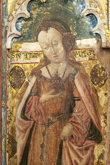Medieval paintings of saints on rood screen inside church of Saint Andrew, Bramfield, Suffolk, England, UK, Saint Mary of Magdala