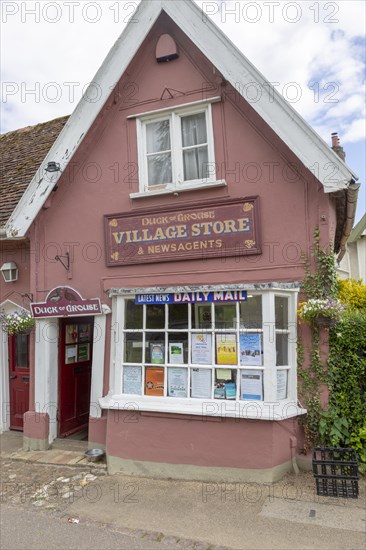 Duck or Grouse village store shop with low doorway, Cavendish, Suffolk, England, UK