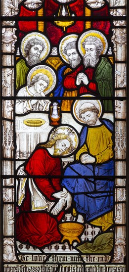 Stained glass window East Bergholt church, Suffolk, England, UK c 1881 by Clayton and Bell detail off Jesus washing feet, he loved them to the end