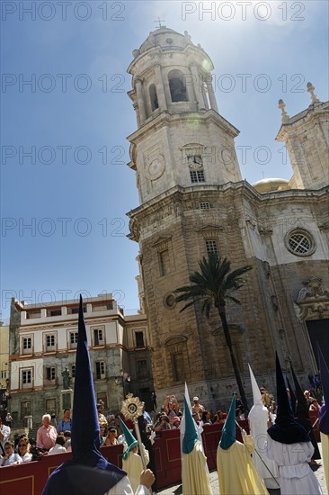 Semana Santa, procession with Nazarenos and tourists, celebrations in Cadiz, Spain, Europe