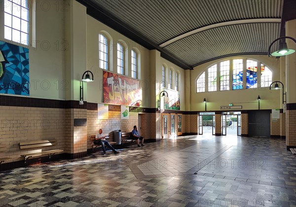 Entrance area waiting hall with artwork Four Elements by Horst Bohatschek, Loehne railway station, North Rhine-Westphalia, Germany, Europe