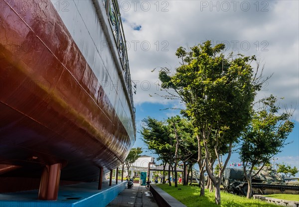 Side view of retired Coast Guard frigate on display at seaside park in Seosan, South Korea, Asia