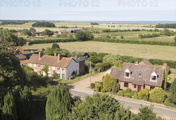 North Sea farming landscape over fields in summer at Bawdsey, Suffolk, England, UK view from church tower