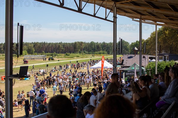 Race day at the racecourse in Hassloch, Palatinate. An estimated 3, 000 to 4, 000 spectators were present in beautiful summer weather and not too hot temperatures