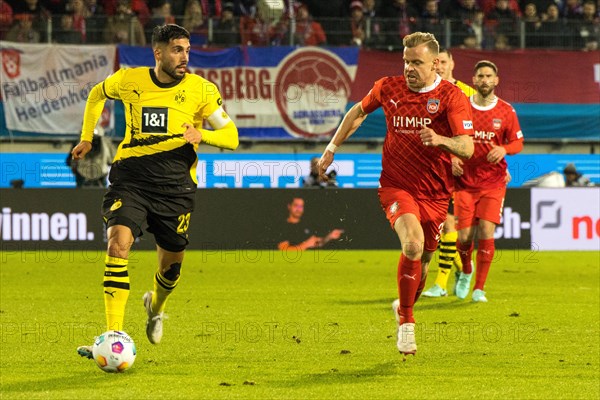 Football match, Emre CAN Borussia Dortmung on the ball in a duel with Lennard MALONEY 1.FC Heidenheim right, football stadium Voith-Arena, Heidenheim