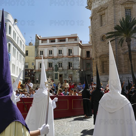 Semana Santa, procession with Nazarenos and tourists, celebrations in Cadiz, Spain, Europe