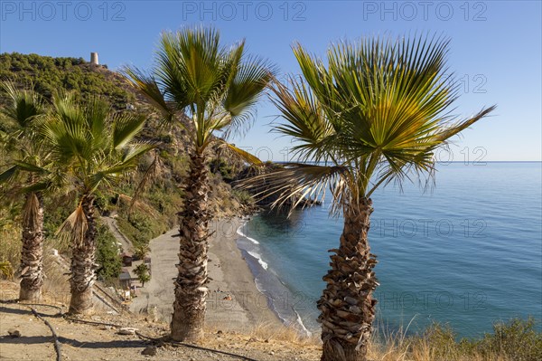 Sandy beach of Playa de Maro, near Nerja, Andalusia, Spain with calm Mediterranean Sea, out of season