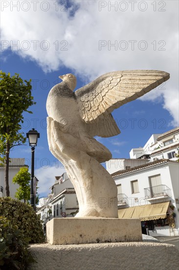 Artwork sculpture of hand holding dove of peace, Mijas pueblo, Malaga province, Andalusia, Spain, Europe