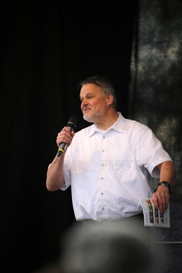 Molecular biologist Dr Stefan Lanka speaks at the large-scale lateral thinking demonstration in Stuttgart. The motto of the demonstration was Fundamental rights are not negotiable