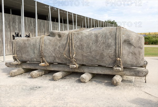 Replica of giant stone megalith on wooden rollers Stonehenge, Wiltshire, England, UK