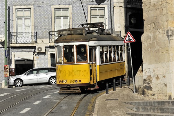 Trams on line 28, Alfama neighbourhood, Lisbon, Lisboa, Portugal, Europe