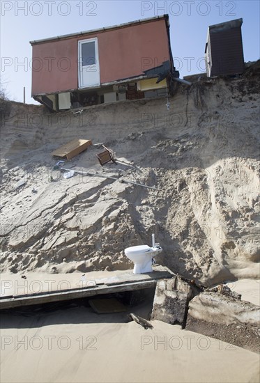 March 2018, Clifftop property collapsing due to coastal erosion after recent storm force winds, Hemsby, Norfolk, England, UK