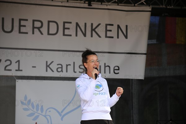 Karlsruhe: Tina Romdhani speaks about the situation of children, especially in schools, as part of the Corona protests against the measures taken by the federal government. The protests were organised by the Querdenken 721 Karlsruhe initiative