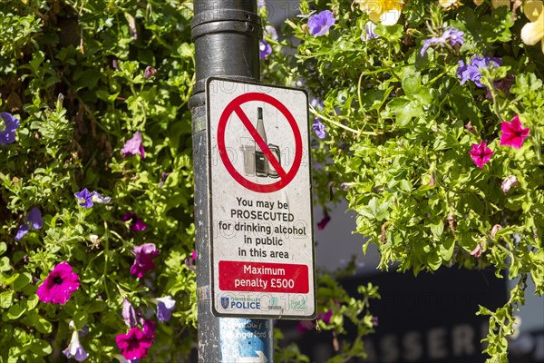 Sign warning about prosecution for drinking alcohol in public area, Newbury, Berkshire, England, UK