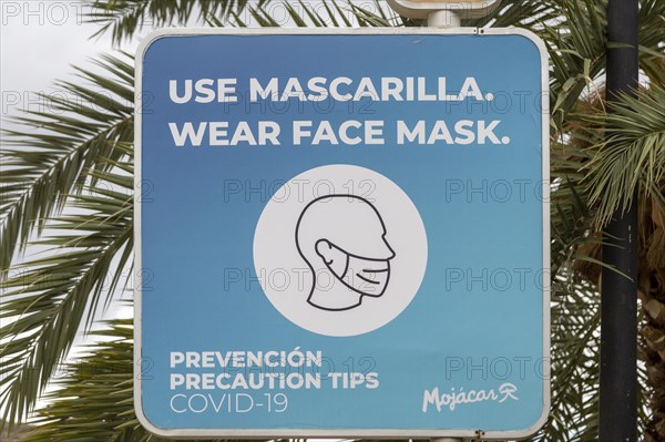 Use Mascarilla, Wear face Mask, Covid-19 precautions sign, Mojacar, Spain, Europe