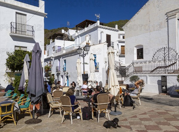 People and cafes in church square plaza, Plaza de la Iglesia, Frigiliana, Axarquia, Andalusia, Spain, Europe