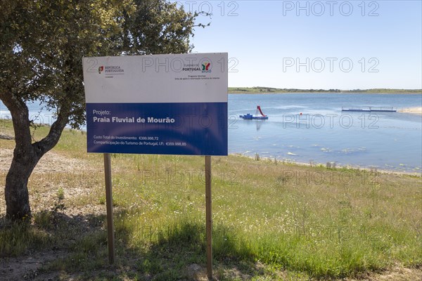 Sign for freshwater beach on reservoir lake at Mourao, Alentejo Central, Evora district, Portugal, southern Europe, Europe