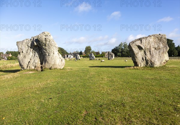Standing stones portal entrance to neolithic stone circle henge prehistoric monument, Avebury, Wiltshire, England UK
