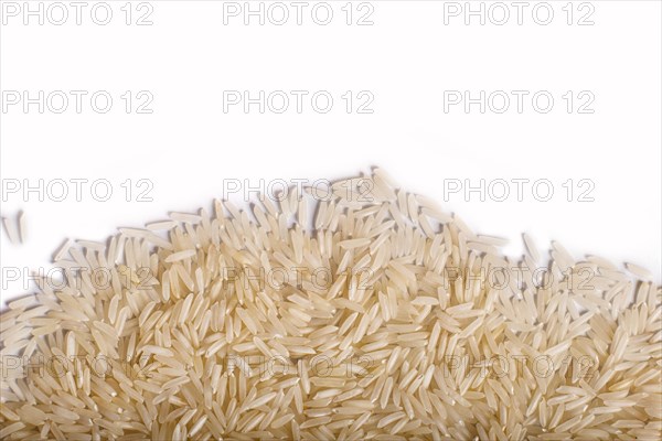 Texture of basmati rice isolated on white background. Top view. Copy space