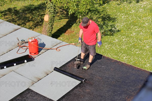 Professional flat roof waterproofing with bitumen welding membranes