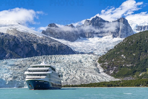 Cruise ship Stella Australis anchors in front of the Pia Glacier, Alberto de Agostini National Park, Avenue of the Glaciers, Chilean Arctic, Patagonia, Chile, South America