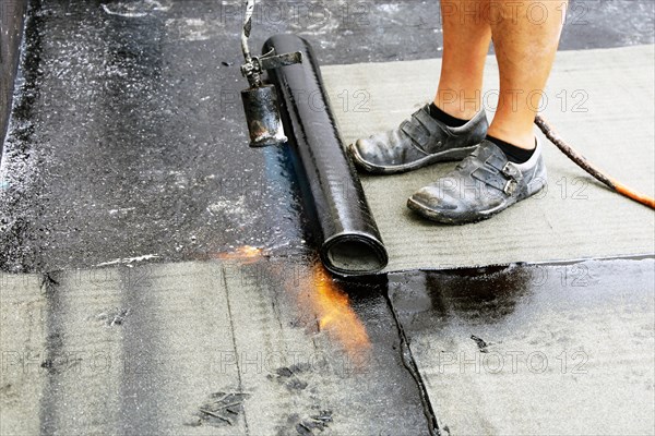 Professional flat roof waterproofing with bitumen welding membranes