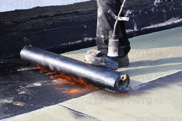 Professional flat roof waterproofing with bitumen welding membranes