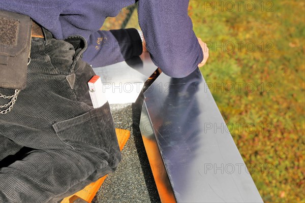 Tinsmith work on a flat roof