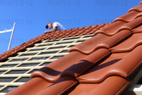 Roofing work, re-roofing of a tiled roof