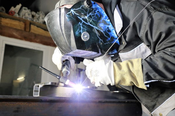 Metal worker during welding work