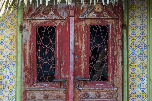 Caribbean wooden house facade, wooden house, pastel, pastel, facade, building, architecture, entrance, terrace, dilapidated, faded, withered, old, empty, abandoned, colourful