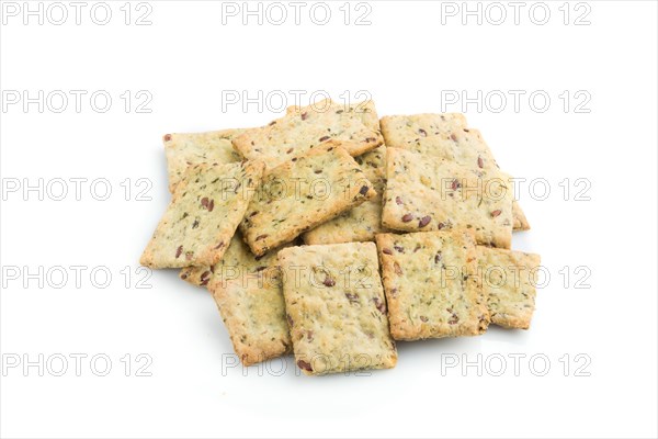Small bread chips cookies with seeds isolated on white background. side view, close up