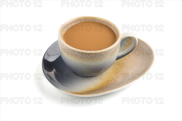 Cup of coffee with cream on ceramic plate isolated on white background, side view, close up