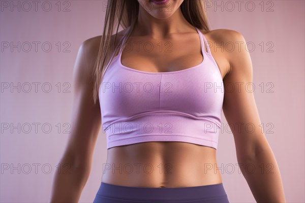 Toned torso of young athletic woman it sports clothes. KI generiert, generiert AI generated