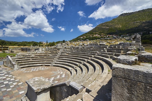 Ancient amphitheatre with stone seats and ruins in Greece, sanctuary of Asclepius, Ecclesiasterion, meeting place of the citizens, archaeological site, Ancient Messene, capital of Messinia, Messini, Peloponnese, Greece, Europe