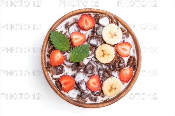 Chocolate cornflakes with milk and strawberry in wooden bowl isolated on white background. Top view, flat lay, close up