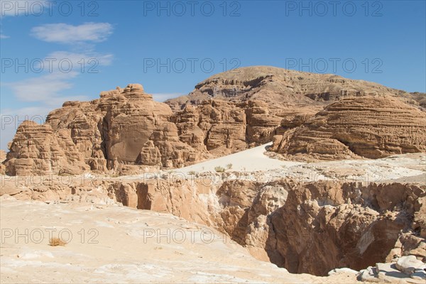 Desert, red mountains, rocks and blue sky. Egypt, the Sinai Peninsula, Dahab