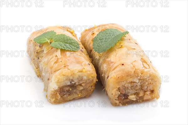 Traditional arabic sweets baklava isolated on white background. side view, close up