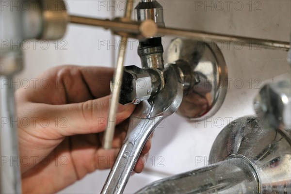 Close-up of sanitary work on a washbasin