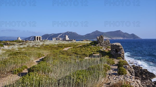 Ancient ruins on a rocky coastal landscape overlooking the sea, sea fortress Methoni, Peloponnese, Greece, Europe