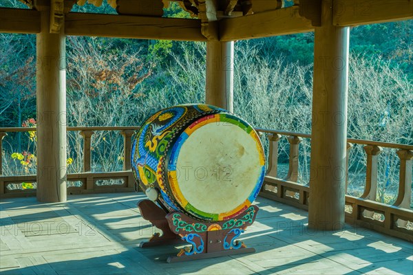 Colorful Korean traditional drum on display in wooden pavilion in South Korea