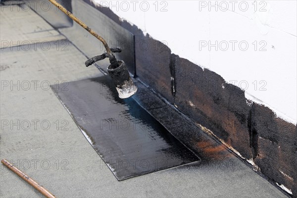 Professional flat roof waterproofing with bitumen welding membranes