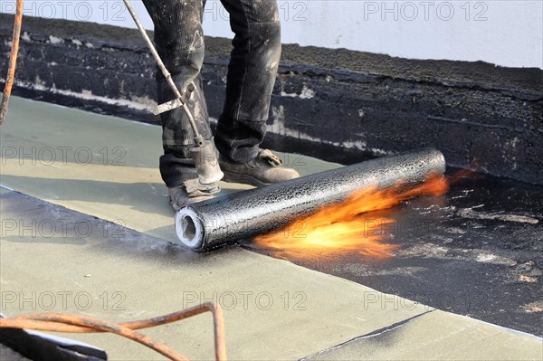 Professional flat roof waterproofing with bitumen welding membranes