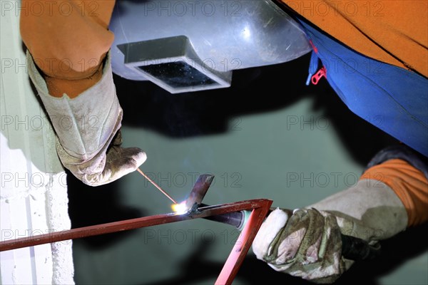 Metal worker during welding work